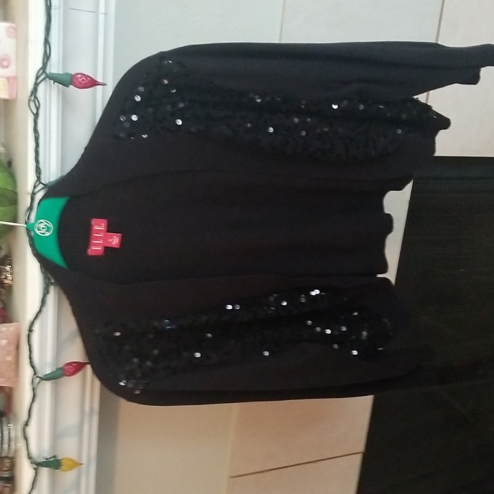 A front sparkle crop jacket in a size XL